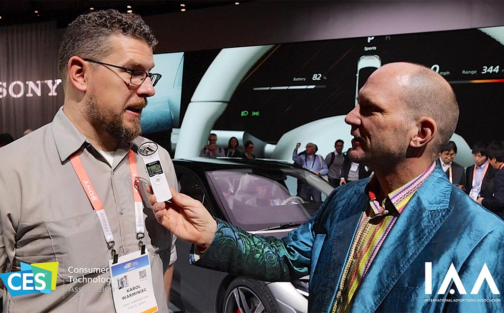 Tim Reha interviewing an automotive technology leader at CES