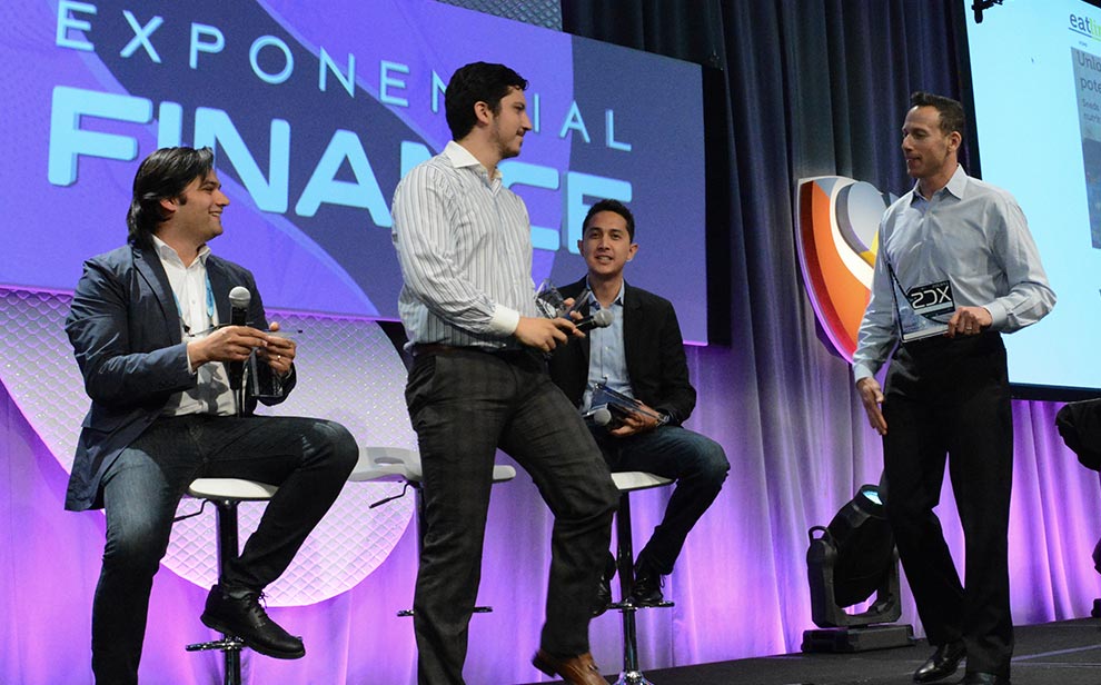 Panelists on stage at Singularity University’s Exponential Finance conference